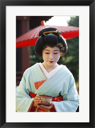 Framed Young woman dressed as a Geisha, Japan Print