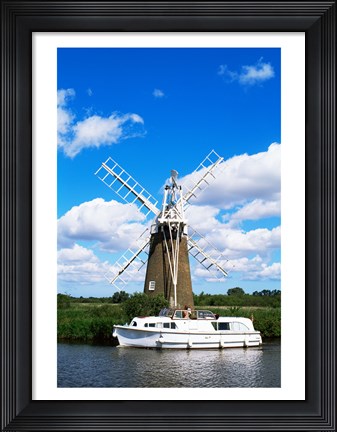Framed Low angle view of a traditional windmill, Thurne, Norfolk Broads, Norfolk, England Print