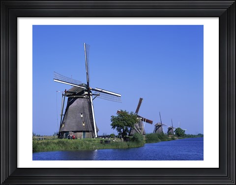 Framed Windmills along a river, Kinderdike, Amsterdam, Netherlands Print
