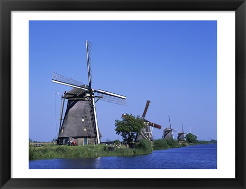 Framed Windmills along a river, Kinderdike, Amsterdam, Netherlands Print