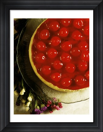 Framed Close-up of a cherry covered cheesecake Print