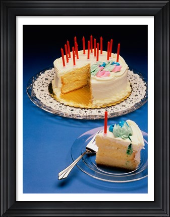 Framed Close-up of candles on a birthday cake Print