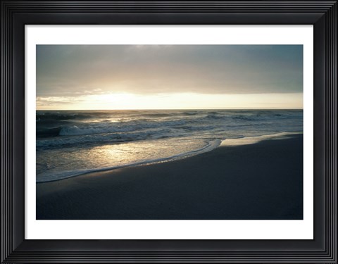 Framed Waves breaking on the beach at sunrise Print
