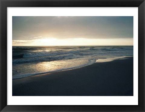 Framed Waves breaking on the beach at sunrise Print