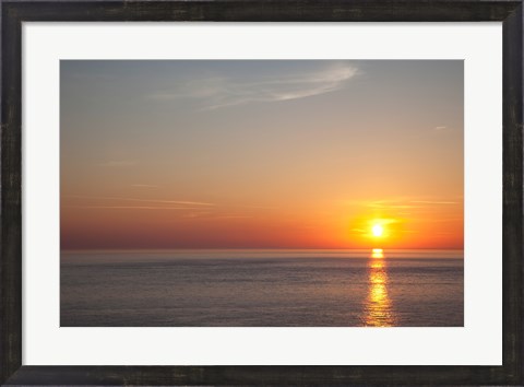 Framed Sunrise over the sea Print