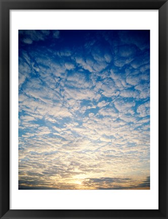 Framed Low angle view of sunrise seen through clouds Print