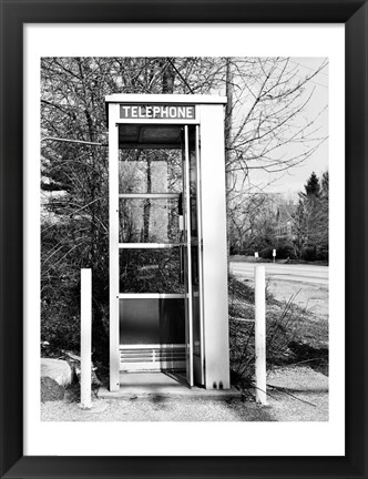 Framed Telephone booth by the road Print