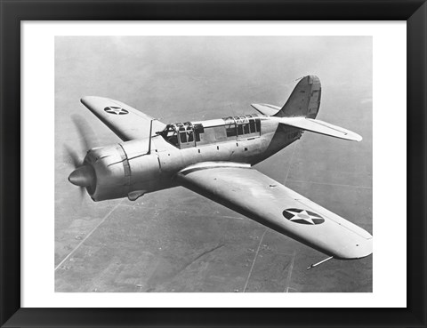 Framed High angle view of a fighter plane in flight, Curtiss SB2C Helldiver, December 1941 Print