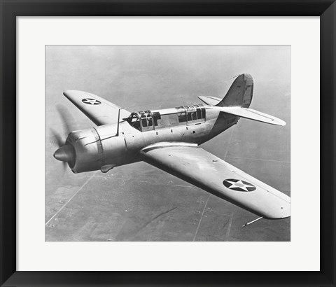 Framed High angle view of a fighter plane in flight, Curtiss SB2C Helldiver, December 1941 Print