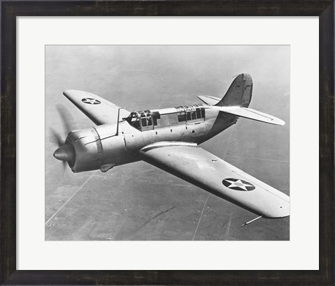Framed High angle view of a fighter plane in flight, Curtiss SB2C Helldiver, December 1941 Print
