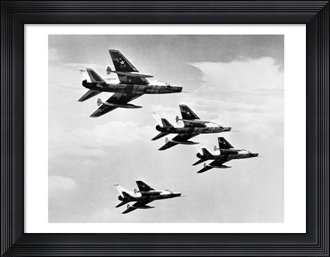 Framed Low angle view of four fighter planes flying in formation, F-100 Super Sabre Print