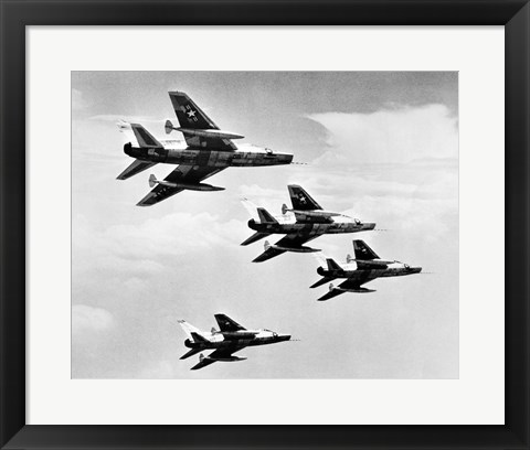 Framed Low angle view of four fighter planes flying in formation, F-100 Super Sabre Print