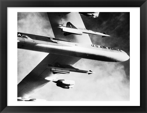 Framed Low angle view of a bomber plane carrying missiles during fight, AGM-28 Hound Dog, B-52 Stratofortress Print