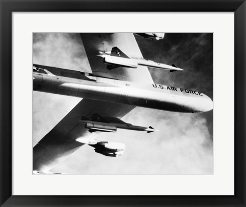 Framed Low angle view of a bomber plane carrying missiles during fight, AGM-28 Hound Dog, B-52 Stratofortress Print