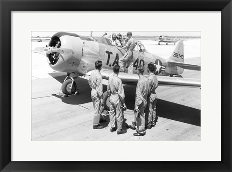 Framed Rear view of four soldiers standing near a fighter plane, T-6 Texan Print