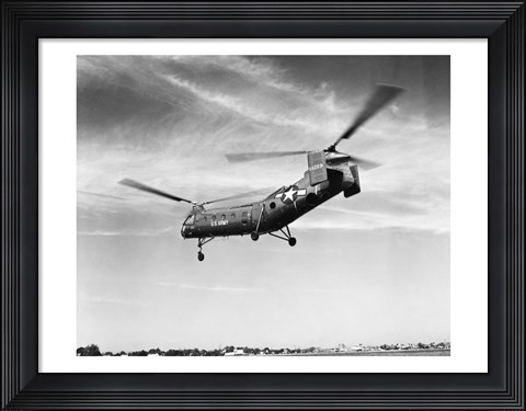 Framed Low angle view of a military helicopter in flight, H-21D Helicopter, US Military Print
