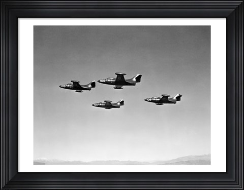 Framed Low angle view of four fighter planes flying in formation, F9F Panther Print