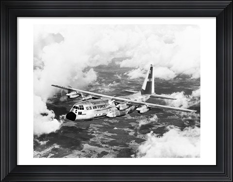 Framed High angle view of a military airplane in flight, C-130 Hercules Print