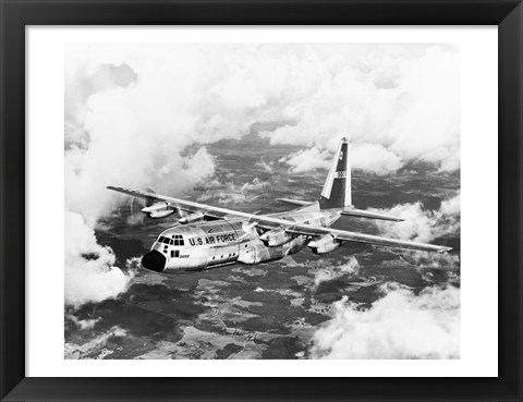 Framed High angle view of a military airplane in flight, C-130 Hercules Print
