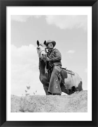 Framed Cowboy on top of escarpment Print