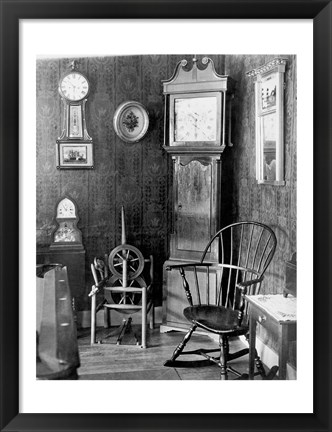Framed Antique clocks in a living room Print