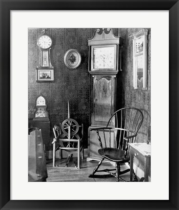 Framed Antique clocks in a living room Print