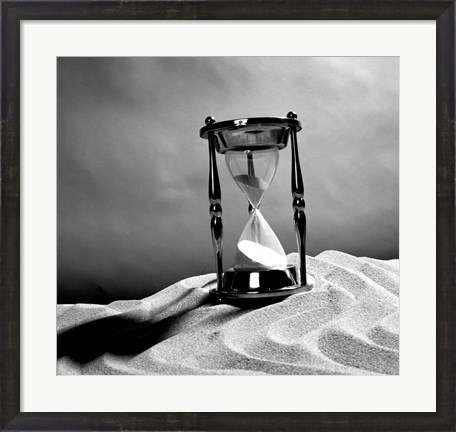 Framed Close up of hourglass on sand Print