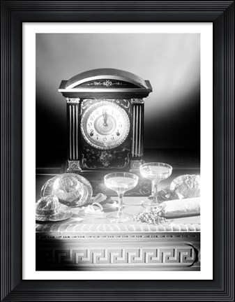 Framed Clock showing 12 o&#39;clock with champagne flutes and party hats in the foreground Print