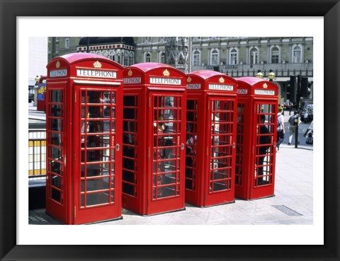 Framed Telephone booths in a row, London, England Print