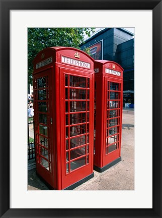 Framed Two telephone booths, London, England Print