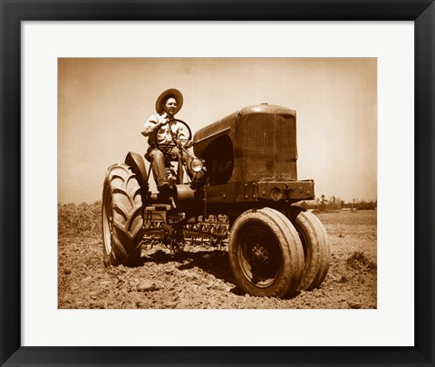 Framed Farmer Plowing a Field with a Tractor Print