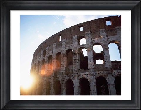Framed Low angle view of the old ruins of an amphitheater, Colosseum, Rome, Italy Print