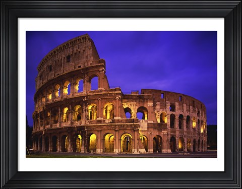 Framed Low angle view of a coliseum lit up at night, Colosseum, Rome, Italy Print