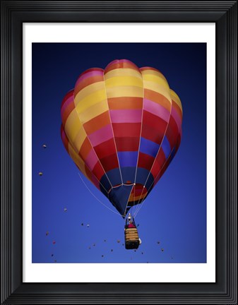 Framed Low angle view of a hot air balloon rising, Albuquerque International Balloon Fiesta, Albuquerque, New Mexico, USA Print