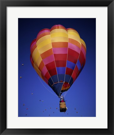 Framed Low angle view of a hot air balloon rising, Albuquerque International Balloon Fiesta, Albuquerque, New Mexico, USA Print