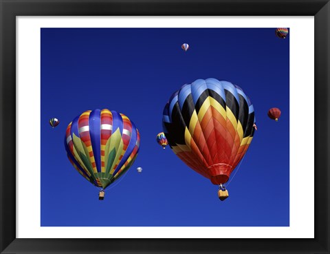 Framed Two Hot Air Balloons Flying Away Together Print