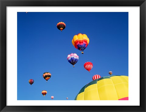 Framed Hot Air Balloons Flying Away in a Group Print