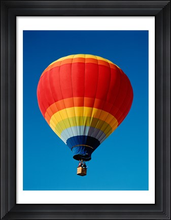 Framed Low angle view of a hot air balloon in the sky, New Mexico, Rainbow Print