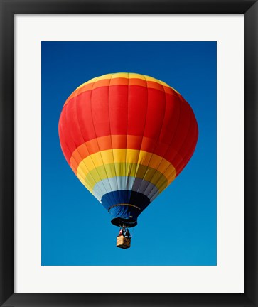 Framed Low angle view of a hot air balloon in the sky, New Mexico, Rainbow Print