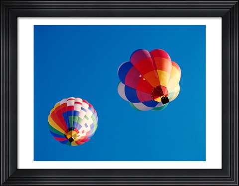 Framed Two Hot Air Balloons Flying Away Print