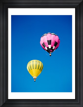 Framed Pink and a Yellow Hot Air Balloon Print