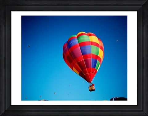 Framed Rainbow Hot Air Balloon with other Hot Air Balloons Far Away Print