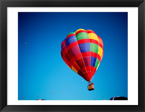 Framed Rainbow Hot Air Balloon with other Hot Air Balloons Far Away Print