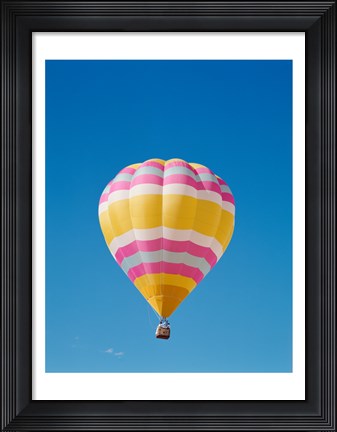 Framed Low angle view of a hot air balloon in the sky, Albuquerque, New Mexico, Yellow &amp; Pink Print