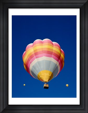 Framed Low Angle Shot of a Rainbow Hot Air Balloon Print