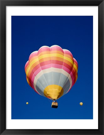 Framed Low Angle Shot of a Rainbow Hot Air Balloon Print