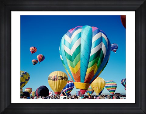 Framed Low angle view of hot air balloons taking off, Albuquerque International Balloon Fiesta, Albuquerque, New Mexico, USA Print