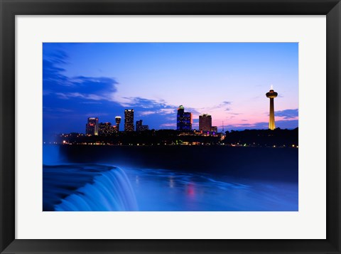 Framed Waterfall with buildings lit up at dusk, American Falls, Niagara Falls, City of Niagara Falls, New York State, USA Print