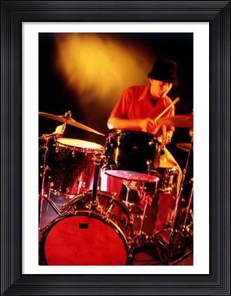Framed Male drummer playing drums Print
