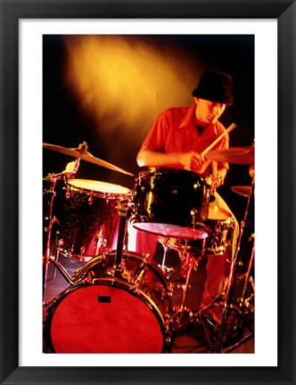 Framed Male drummer playing drums Print